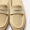 Close up of the toe and vamp of The Penny Loafer Mule in Sandstone Raffia-Knit, showing the penny keeper detail.
