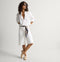 Alternate view of a model wearing The Penny Loafer Mule in Sandstone Raffia-Knit.