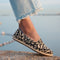 Another view of a model wearing The Cruiser Loafer in Espresso Bloom.