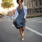 Another view of a model wearing The Cruiser Loafer in White Raffia-Knit. 
