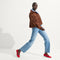Alternate view of a model wearing The T-Strap Mary Jane in Red Crisp.