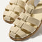 Close up of the straps across the top of The Fisherman Sandal in Coconut. 