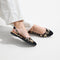hover | Model wearing The Almond Slingback in Desert Cat.
