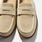 Close up of the toe and vamp of The Penny Loafer in Conch Raffia-Knit.
