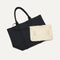 hover | Overlay::Clips onto The Lightweight Tote key leash. | Alt::Actual alt text The Convertible Clutch in Moonflower, focusing on the strap.