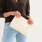 hover  | Model wearing The Convertible Clutch in Moonflower. 