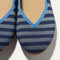 Close up of the toe and vamp of The Daily Flat in Harbor Cabana Stripe. 