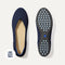 PDP |The Daily Flat in Navy shown from the top with one shoe showing the outsole. 