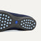 The outsole of The Daily Flat in Navy with raised pegs for extra support. 