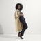 Alternate view of a model wearing The Daily Flat in Black. 