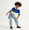 Alternate view of a child wearing The Kids Clog in Black. 