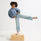 Alternate view of a child wearing The Kids Clog in Dove. 