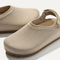 Close up of the rounded topline of The Kids Clog in Dove. 