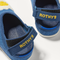 Close up of the back heel strap of The Kids Clog in Indigo Daisy. 