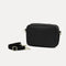 The Crossbody Camera Bag in Black Licorice Open-Knit shown by itself with removable strap. 