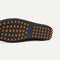 Close up of the supportive peg outsoles of The Men's Daily Driver in Black. 