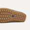 Close up of the supportive peg outsoles of The Men's Daily Driver in Brown Camo. 