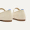 Close up of the heel of The Max Buckle Mary Jane in Cream Woven, with Rothy's signature blue halo.