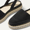 Close up of the vamp of The D'Orsay Espadrille in Black. 