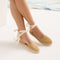 Model wearing The D'Orsay Espadrille in Camel Crochet. 