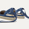 Close up of the heel of The D'Orsay Espadrille in Deep Sea Stripe, showing removable ankle straps.