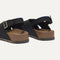 Close up of the heel and adjustable strap of The Weekend Sandal in Black.