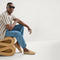 Alternate view of a model wearing The Men's Cruiser Loafer in Husk. 