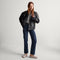 Alternate view of a model wearing The Penny Clog in Dove. 
