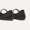 Close up of the heel of The Square Mary Jane in Classic Cheetah, with Rothy's signature blue halo. 