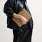hover | Model shown holding the Convertible Clutch in Glitzy Gold.