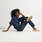 Alternate view of a model wearing The Daily Driver in Sesame. 