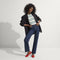 Alternate view of a model wearing The Daily Flat in Showstopper Red. 