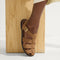 hover | Model wearing The Fisherman Sandal in Pecan. 