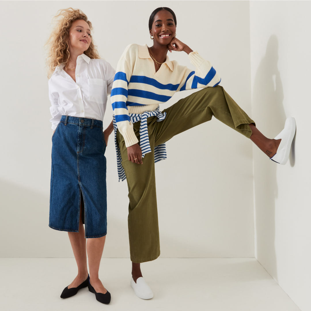 Two models wearing The Point in Black and The Original Slip On Sneaker in Bright White.