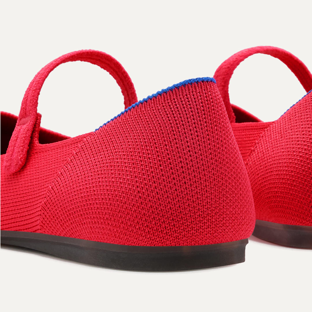 A close up view of the heel and stretchy straps of The Square Mary Jane.