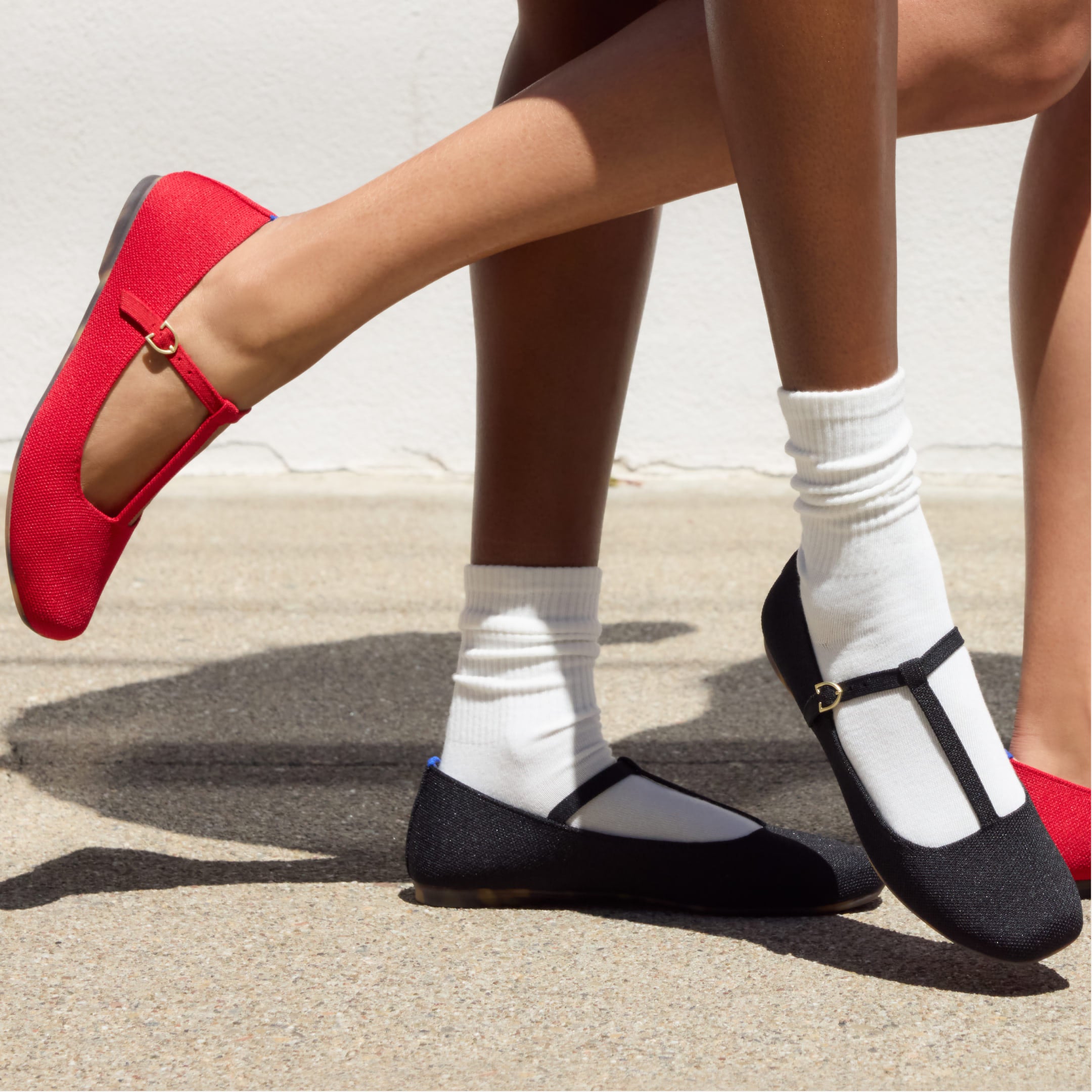 Two models wearing The T-Strap Mary Jane.