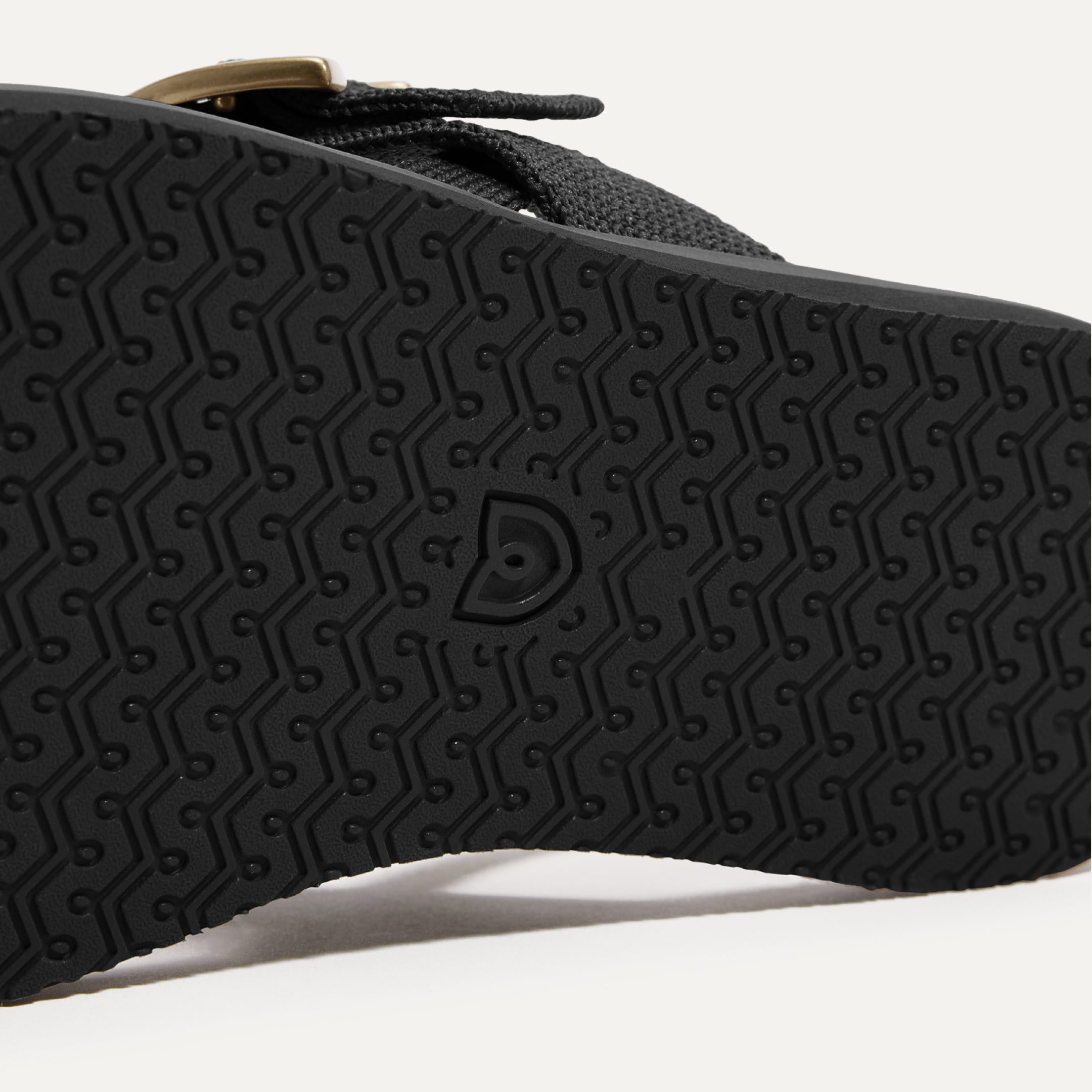 Close up of the outsole of The T-Strap Sandal.